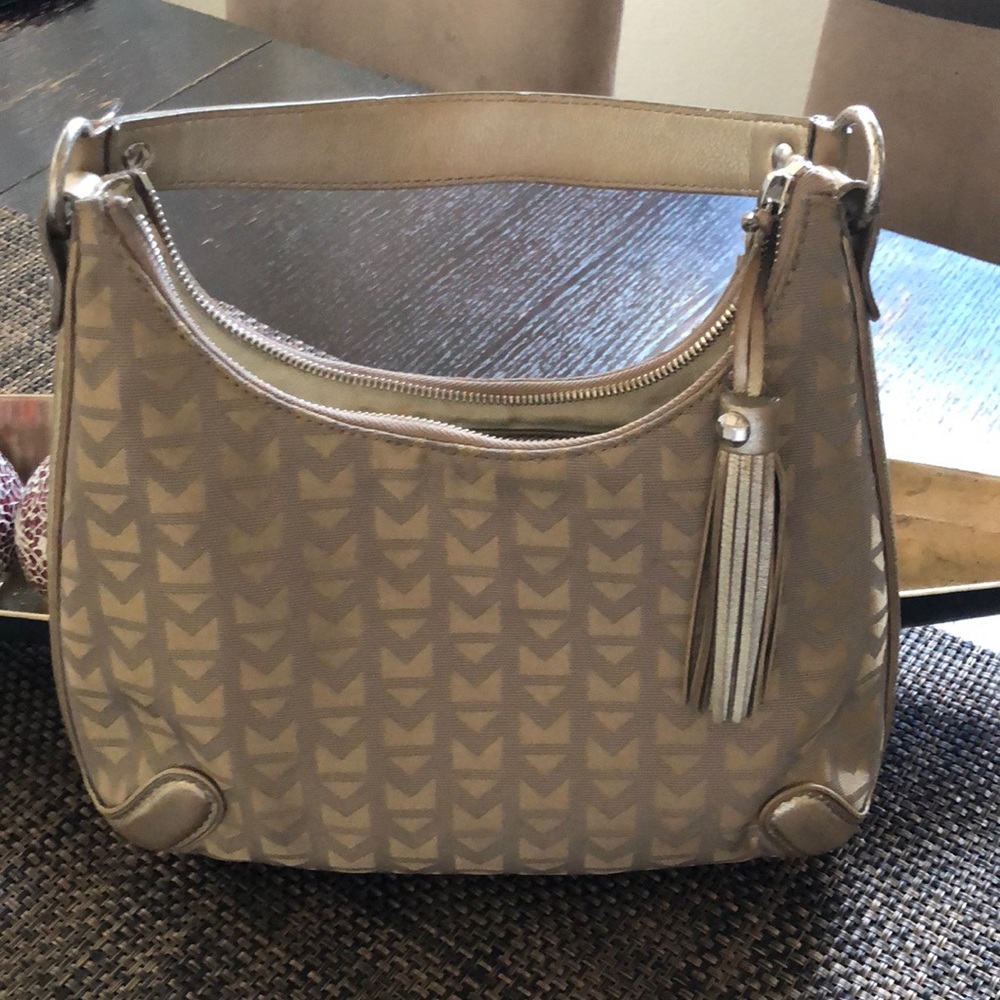 Michael Kors vintage, still in good condition.